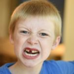 Child with angry face