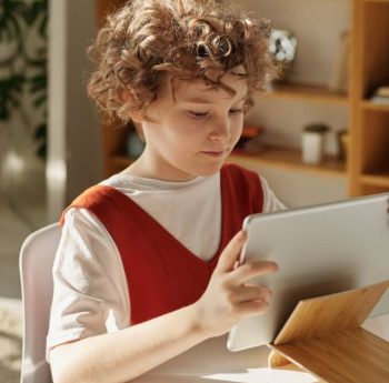 young girl using computer