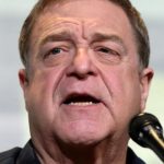 John Goodman. A mature white man with short brown hair