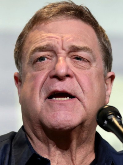 John Goodman. A mature white man with short brown hair