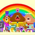 Hey Duggee cartoon characters against a rainbow background.