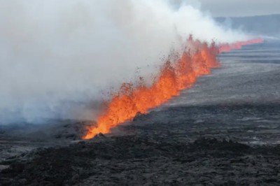 A line of magma bursting out of the ground - part of the Sundhnukur volcano in Iceland.