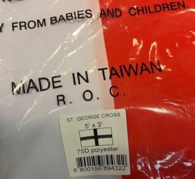 England flag in its wrapper with a description label. Text on the bag; Made in Taiwan ROC